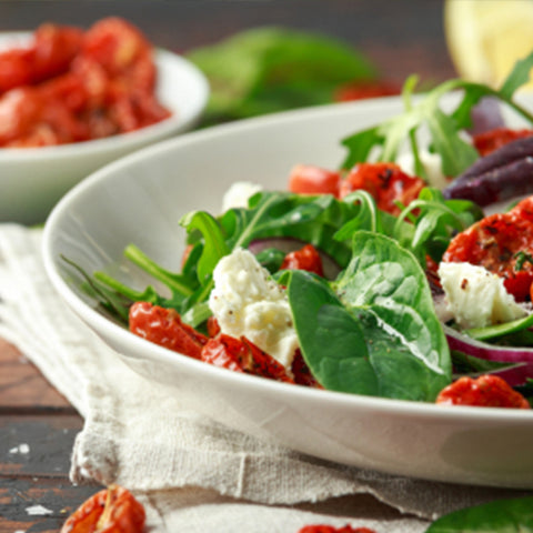A salad with Sun-Dried Tomatoes, spinach and feta cheese from Villa Cappelli.