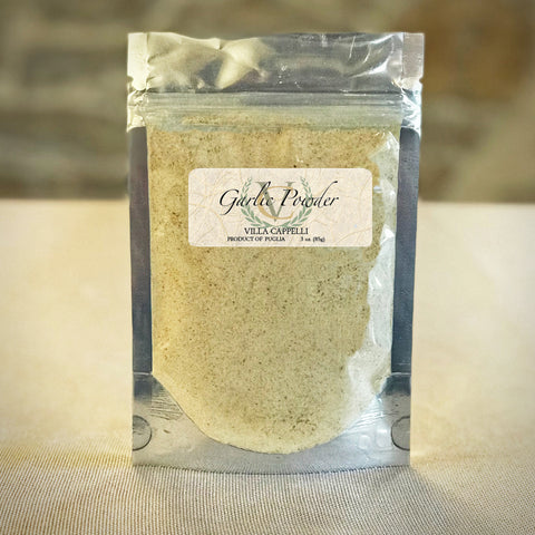 A bag of Delicious Italian Kitchen Collection powdered sugar sitting on a table, with personalized messages and special instructions from Villa Cappelli.