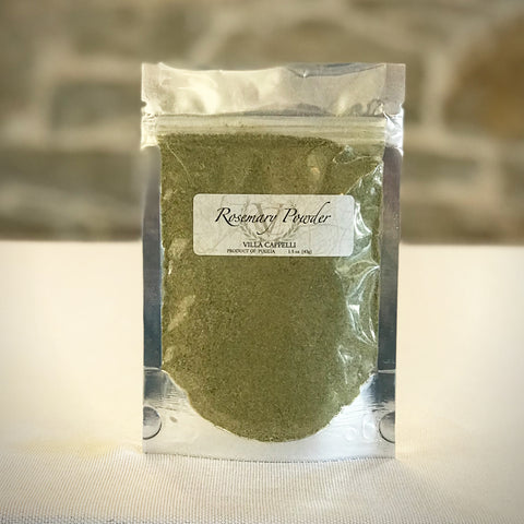 A bag of The Easy Italian Collection green powder used for Italian cooking, sitting on a table, from Villa Cappelli.